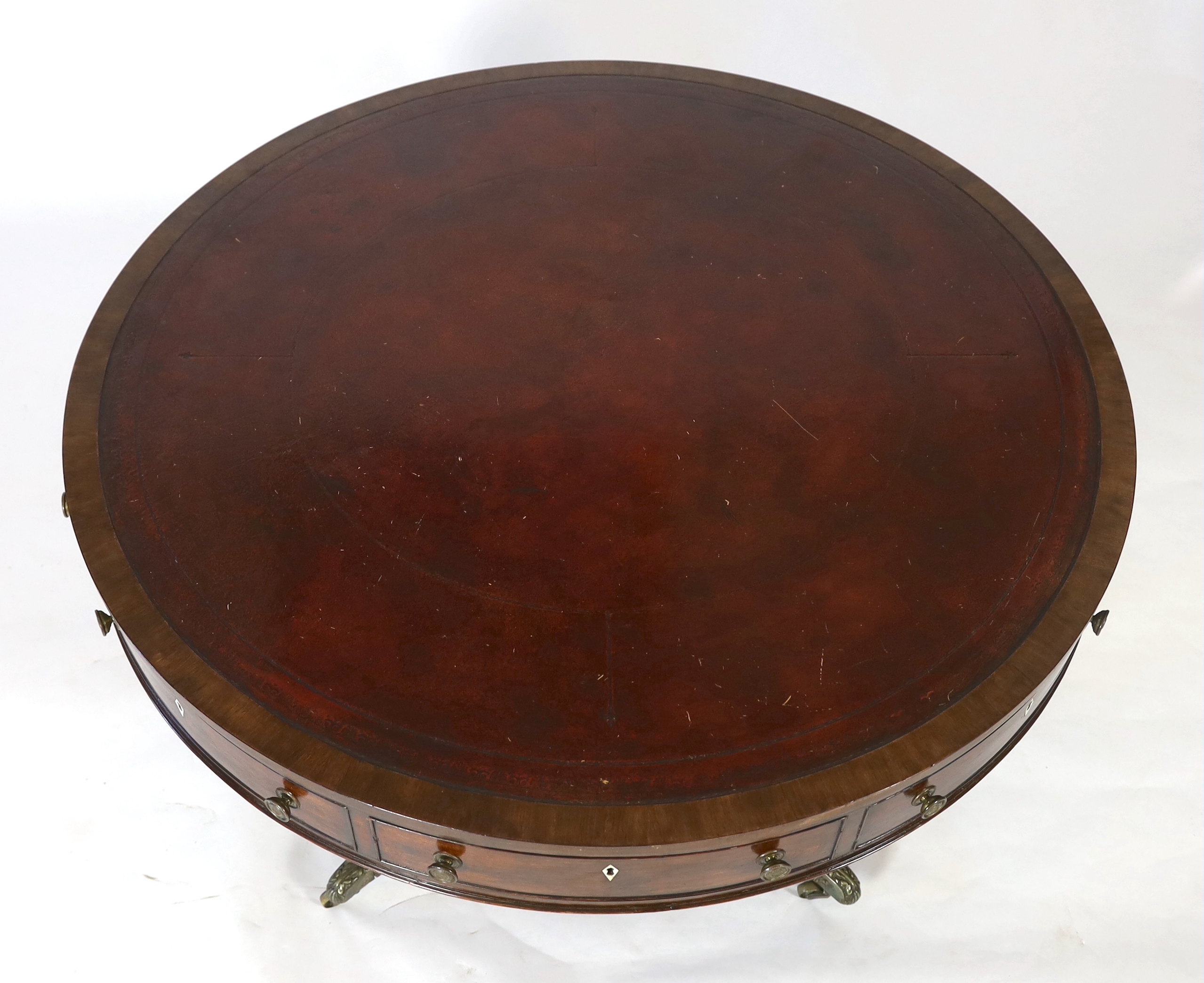 A Regency mahogany drum top library table